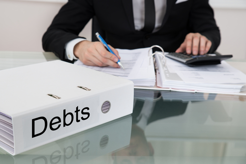 Come risolvere il problema dei debiti accumulati